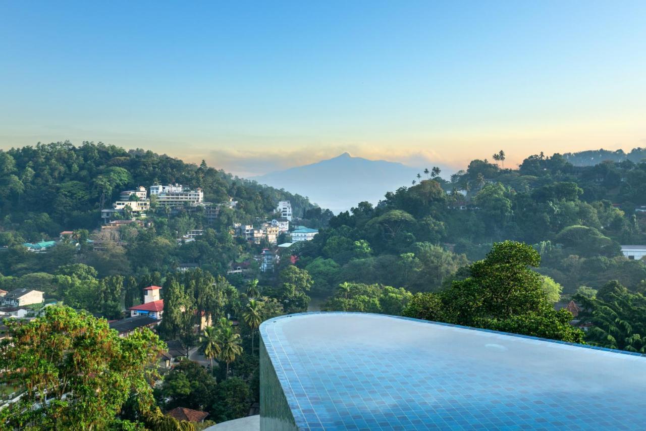 Grand Serendib Hotel Kandy Exterior photo View of Mount Apo from the city