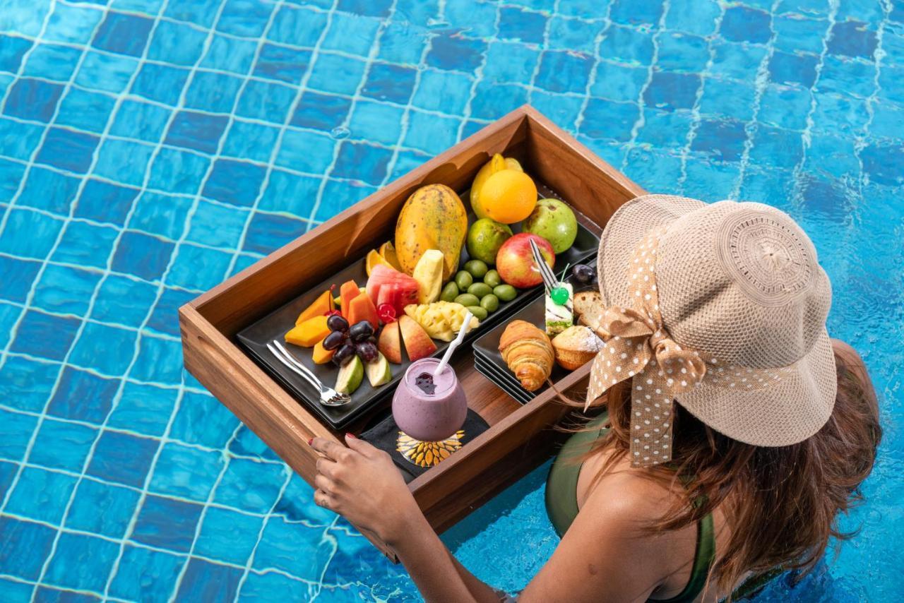 Grand Serendib Hotel Kandy Exterior photo A floating breakfast tray